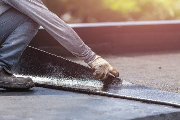 Professional Basement Waterproofing technician working in Jamestown, KY
